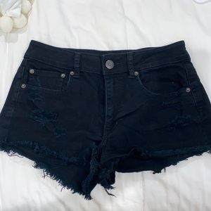 Black denim shorts.